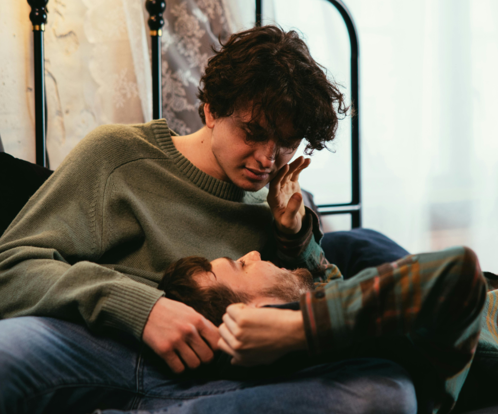 Loving couple sharing a quiet, intimate moment together after couples therapy while relaxing in Utah indoors.