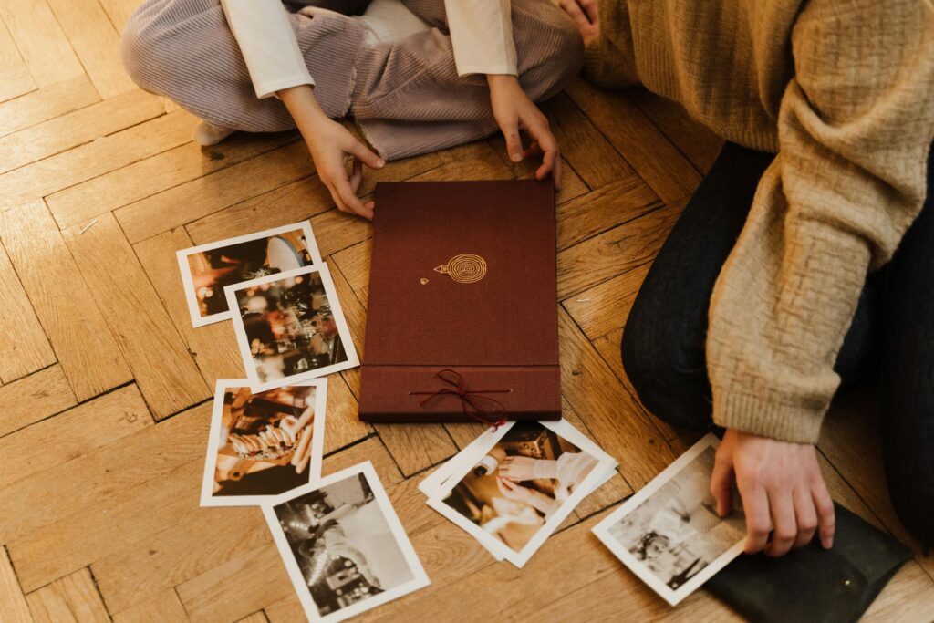 Family looking at a phot album.
