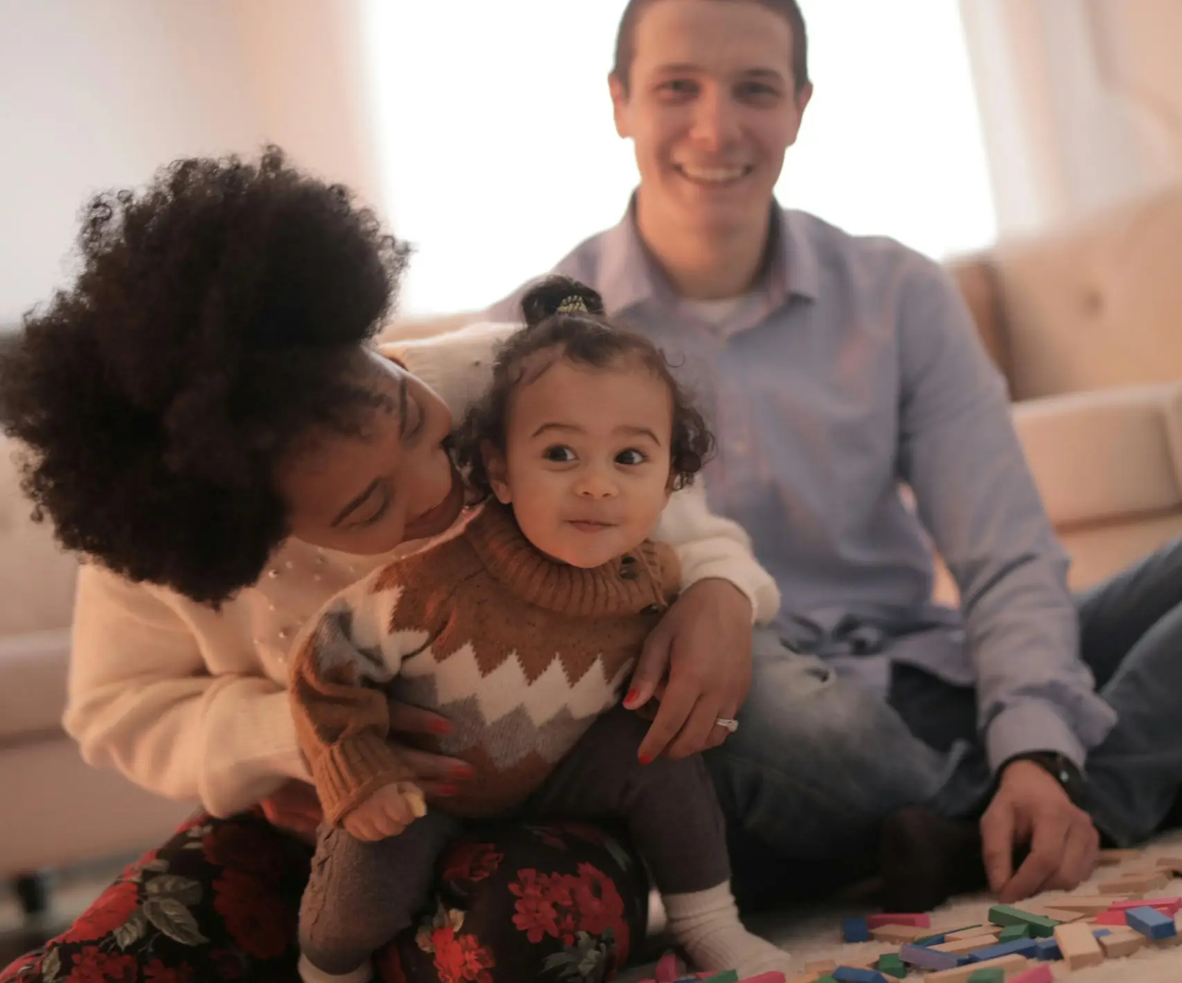 Utah family bonding together in home after family therapy session.