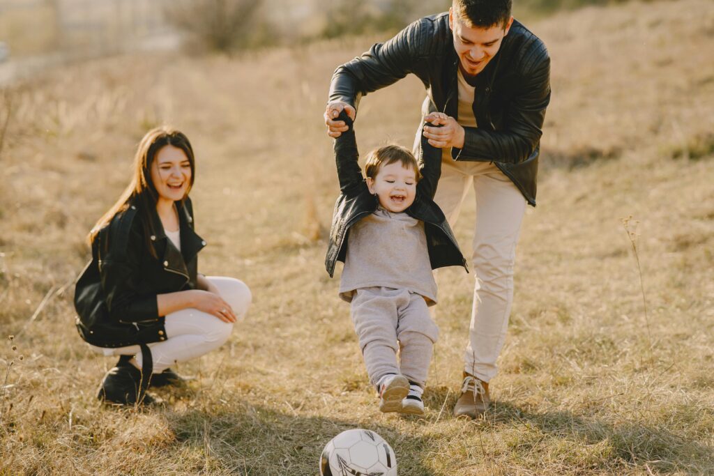 Happy family in a dry landscape.