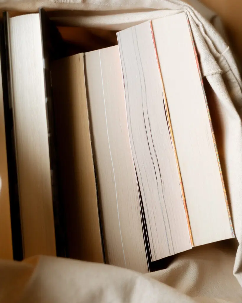Books in a book shelf about Gottman's Therapy Theory.